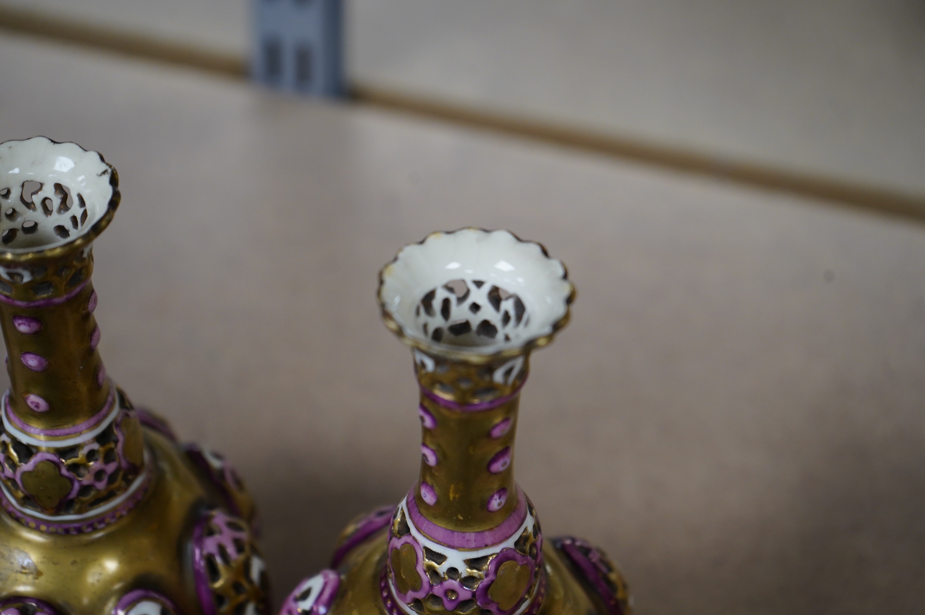 A pair of small Hungarian Zsolnay reticulated vases, 15cm high. Condition - good